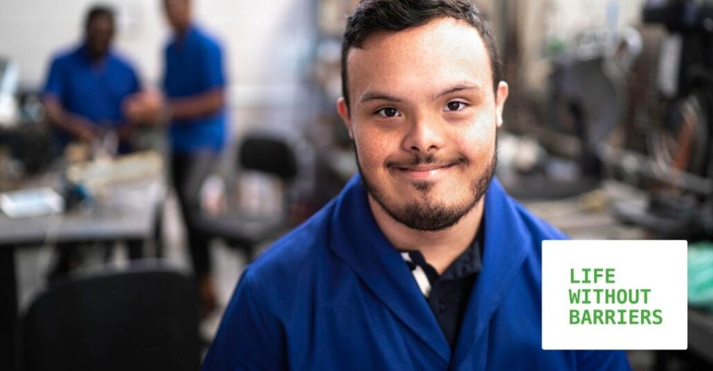 Portrait of special needs employee in industry Portrait of special needs employee in industry