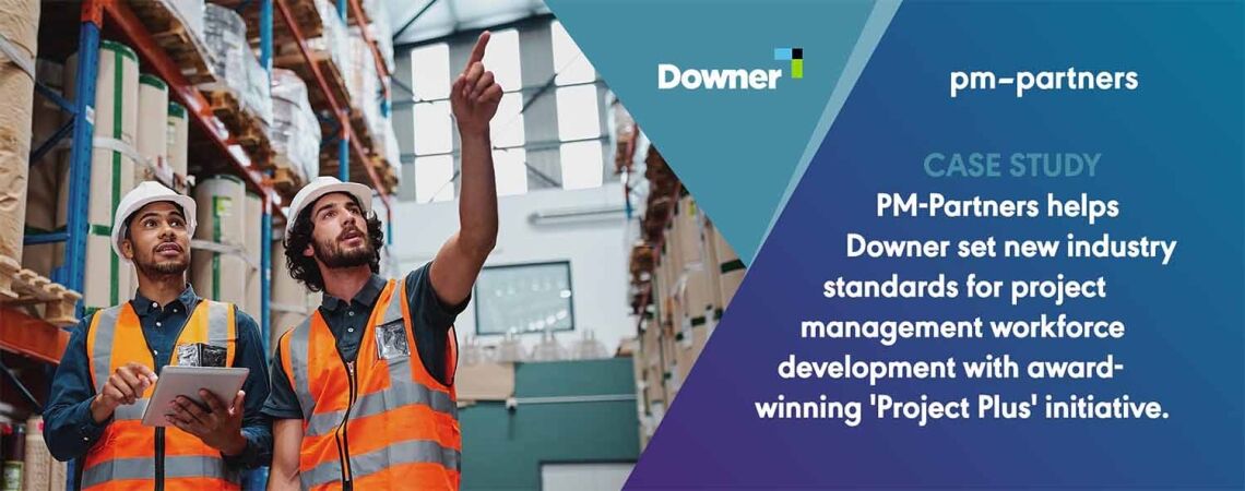 Featured case study for Downer Featured case study for Downer featuring two male workers in high visibility vests in a warehouse