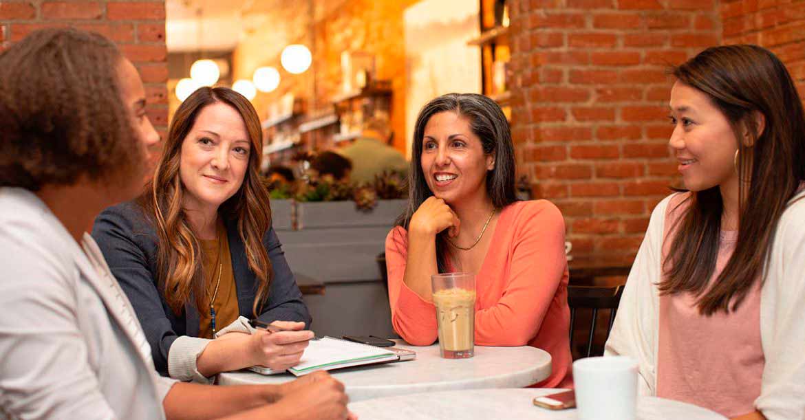 Business women having a meeting in the cafe