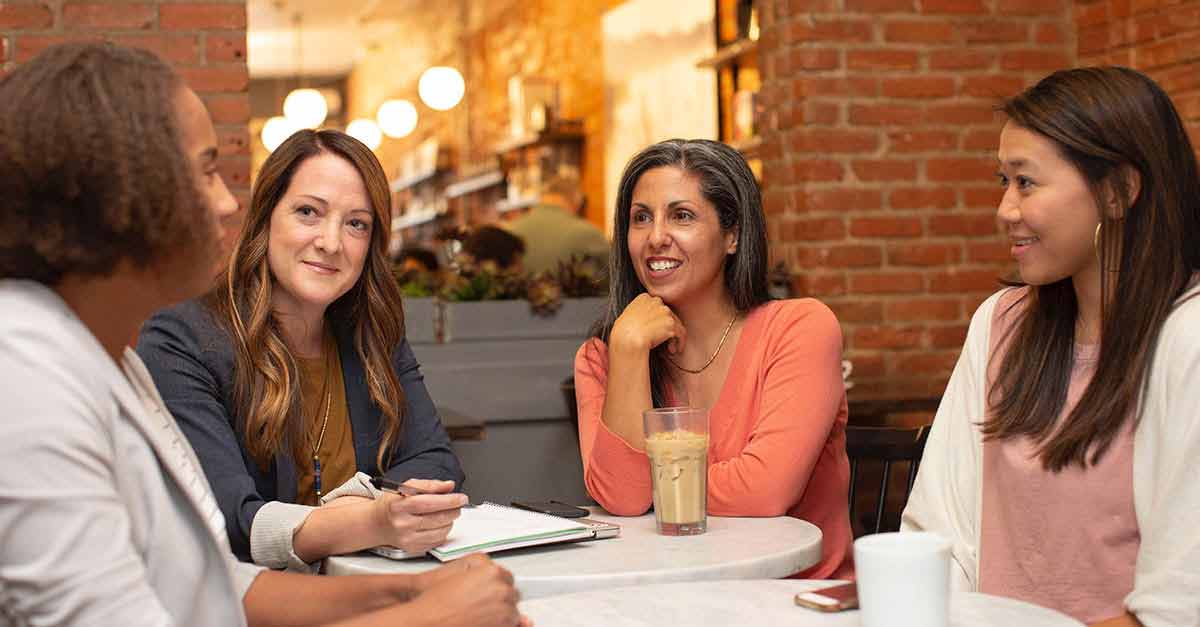 Business women having a meeting in the cafe