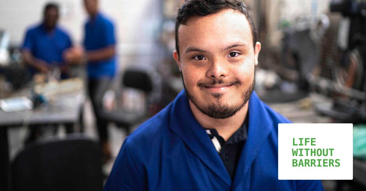 Portrait of special needs employee in industry