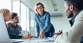 Businesswoman leading business presentation