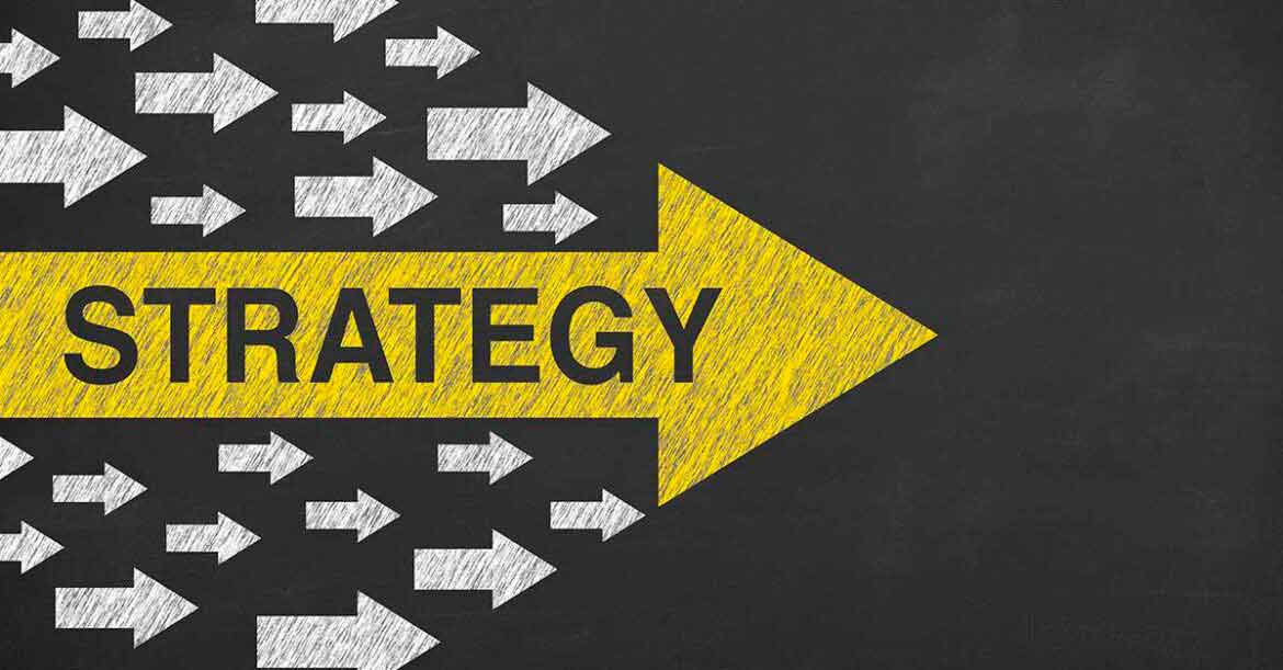 Strategy concepts with arrows on chalkboard background