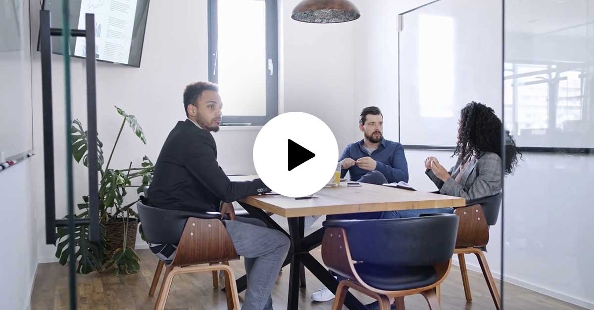 3 people in the boardroom