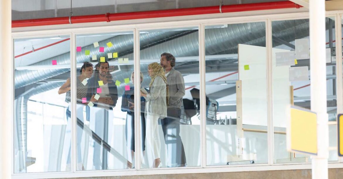 Team working in agile in a large office space