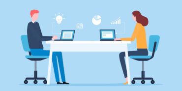 Graphic showing two people sitting opposite one another at share desk